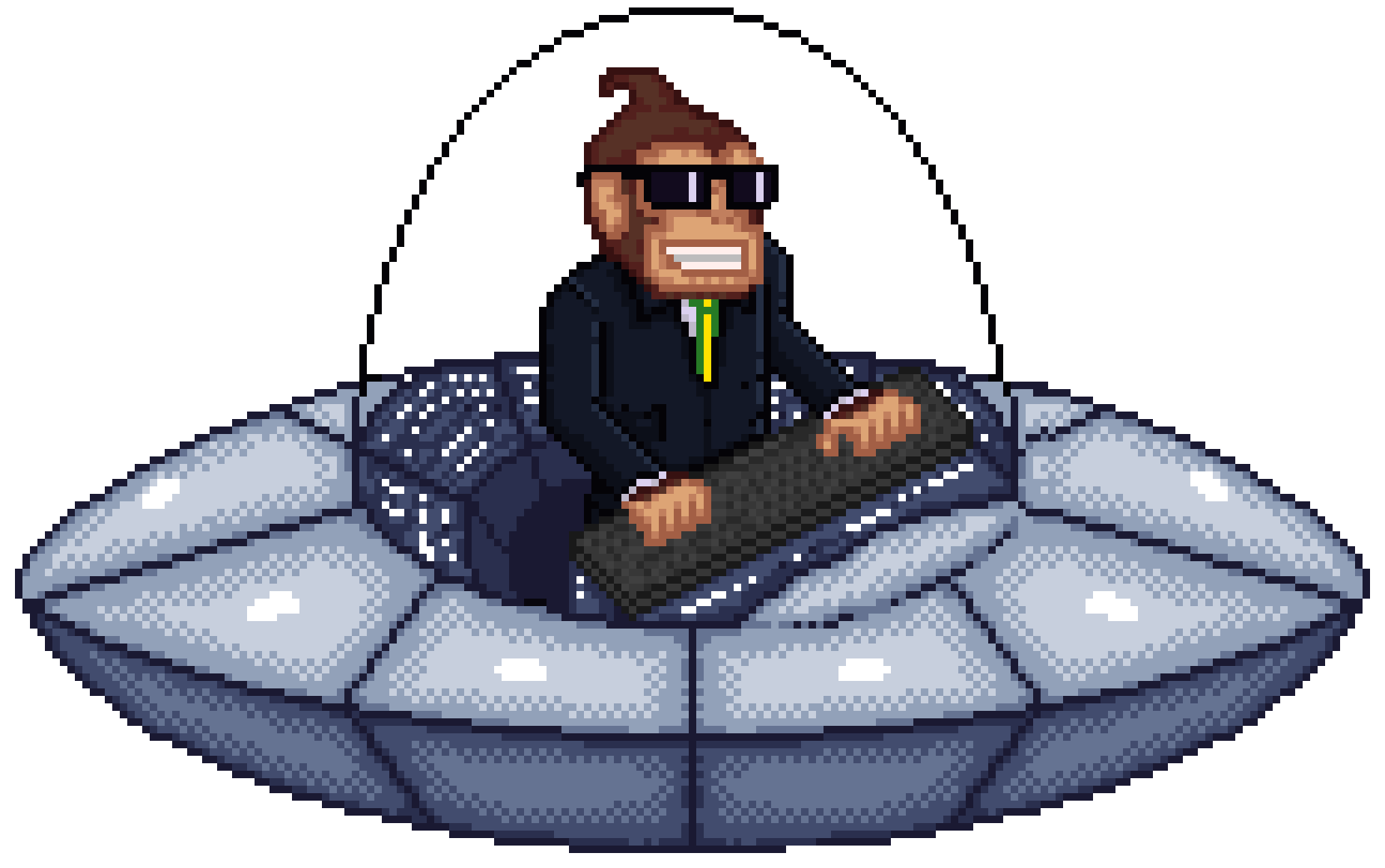Edson typing at his keyboard in his flying saucer